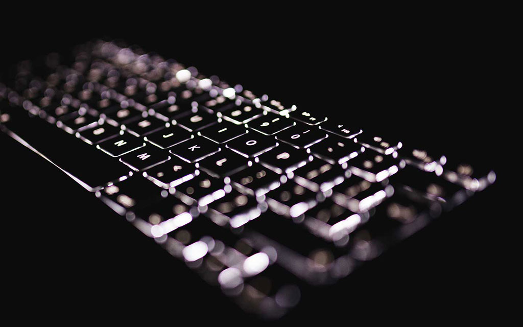Web Design & Development Glowing Keyboard